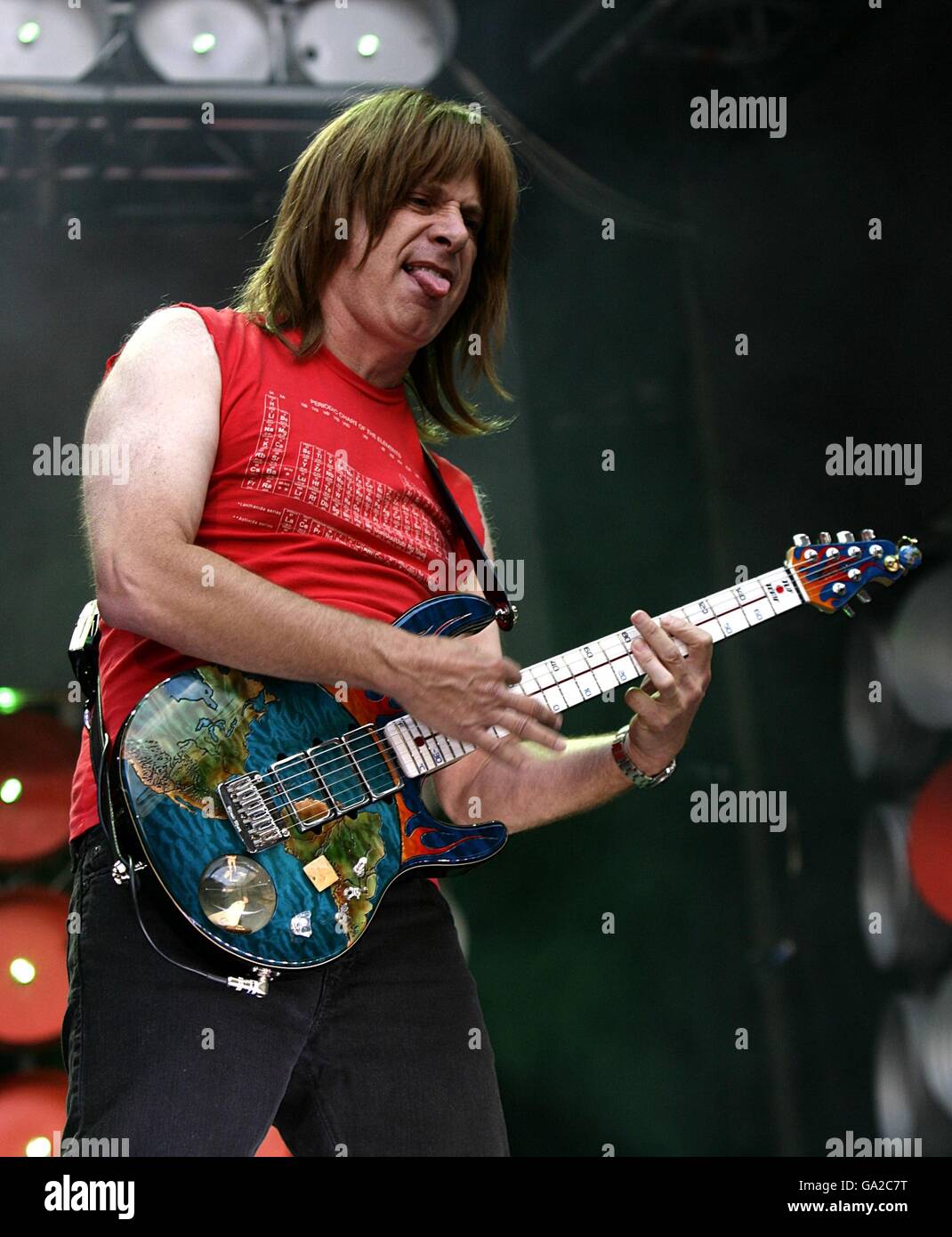 Christopher Guest member of the fictional band Spinal Tap perform during the charity concert at Wembley Stadium, London. Stock Photo
