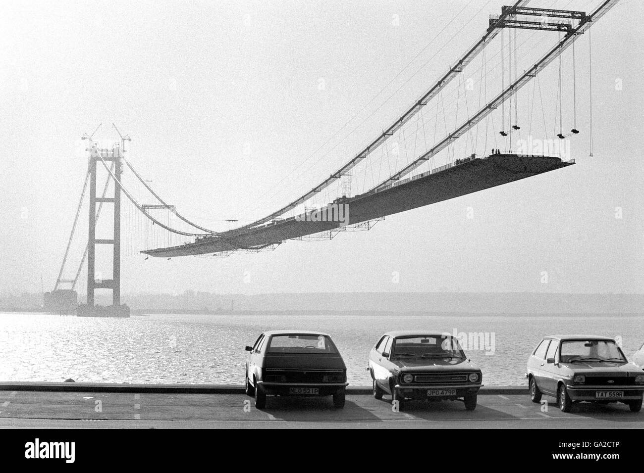 The Humber Bridge, the world's longest single span suspension bridge, during construction. Stock Photo