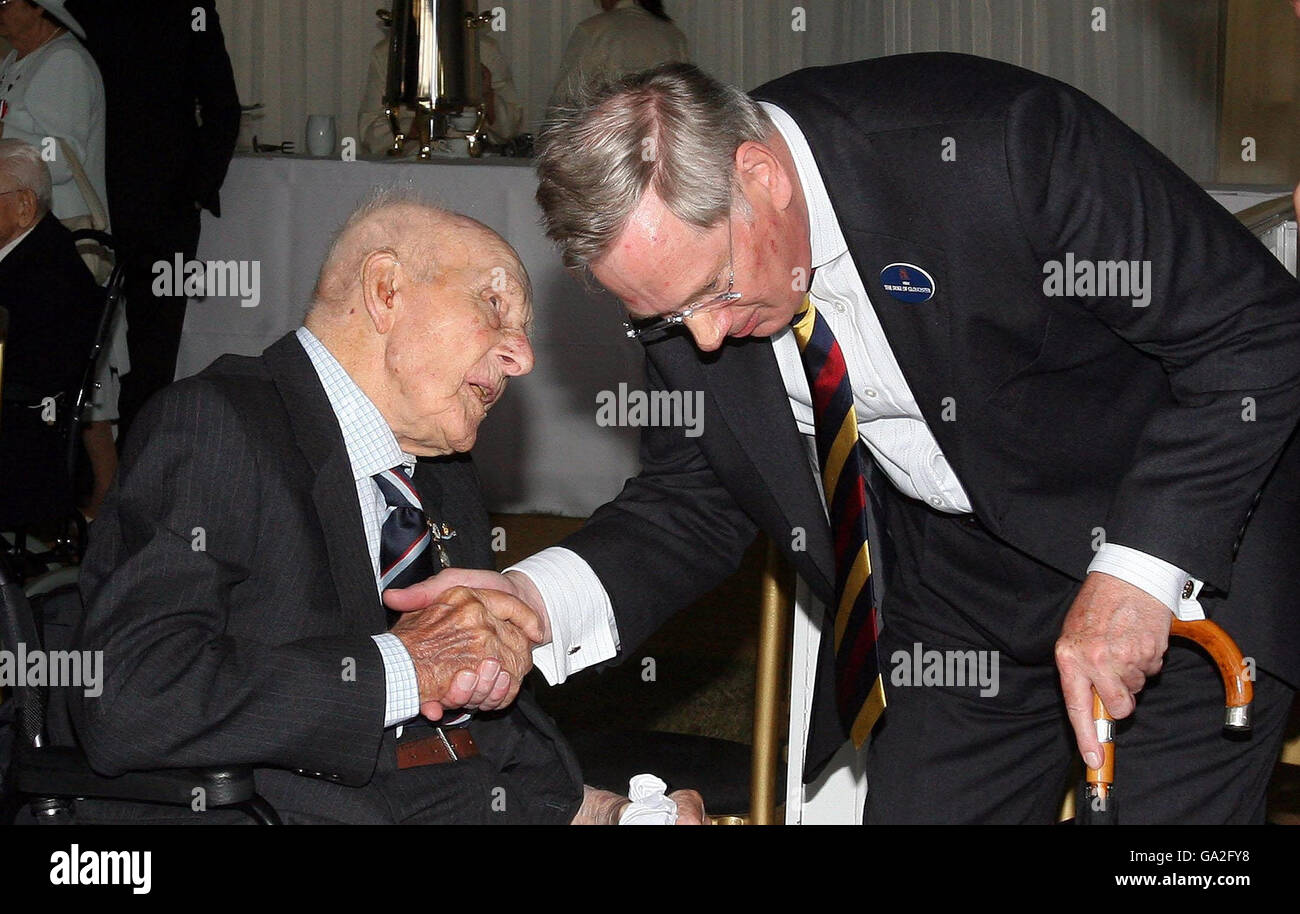 The Duke of Gloucester meets World War 1 Veteran Henry Allingham at a Garden Party for veterans at Buckingham Palace. Stock Photo