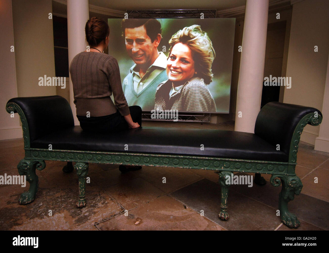 An image of Prince Charles and Princess Diana, the Prince and Princess of Wales, is viewed at her former home Kensington Palace in central London. Stock Photo