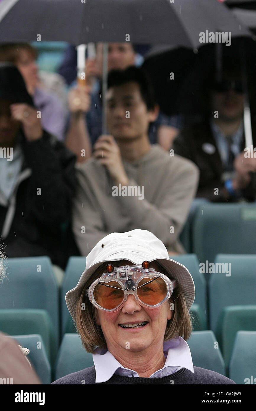Wimbledon fan rain hires stock photography and images Alamy