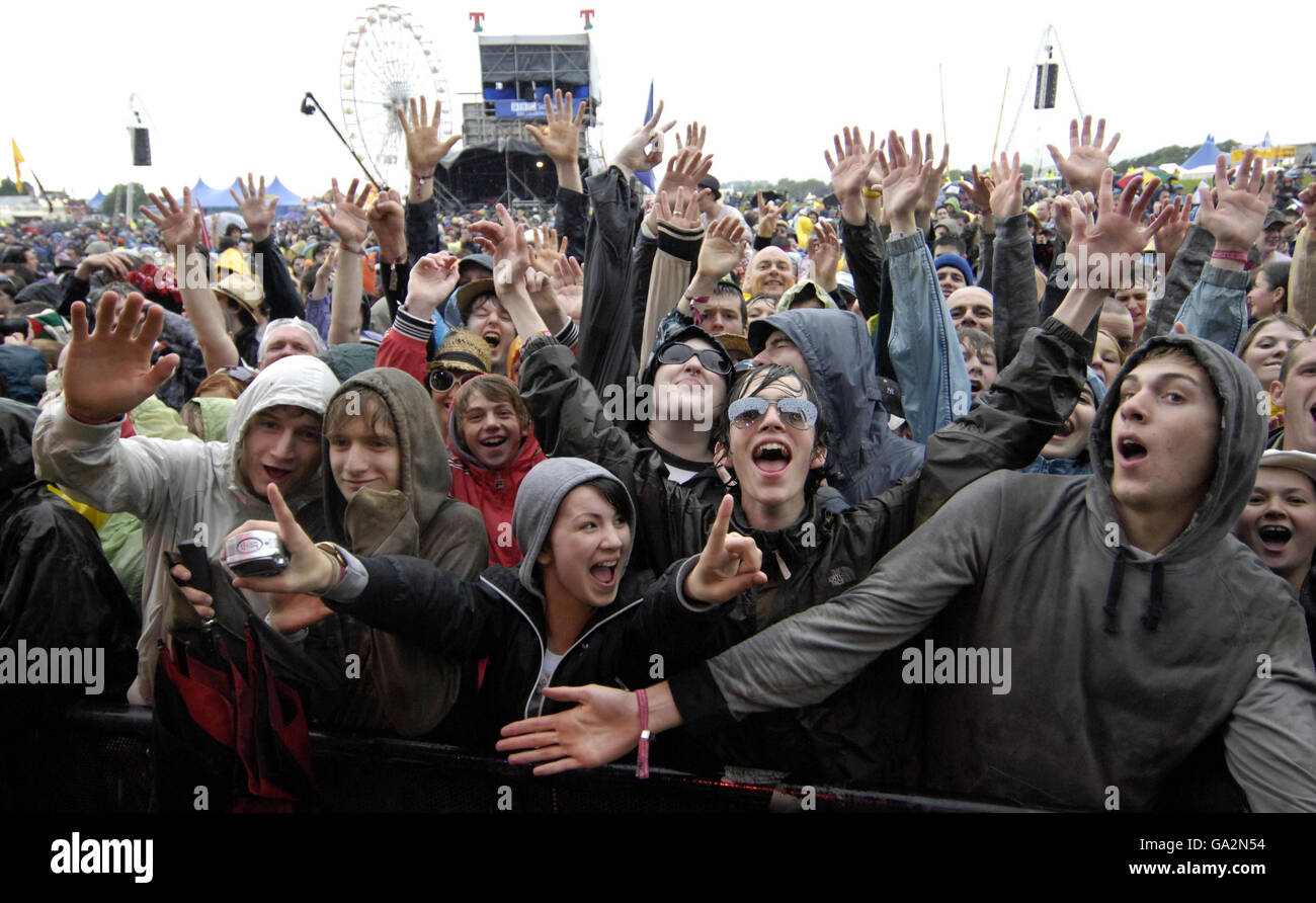 The crowd watch Lily Allen perform on stage at T in the Park in Balado, Perth and Kinross. Stock Photo