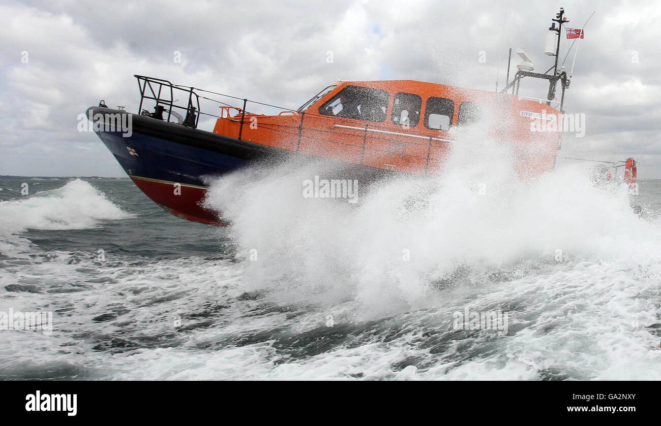 The RNLI's Experimental Lifeboat, the Fast Carriage Boat 2, being put through its paces near Bournemouth. Stock Photo