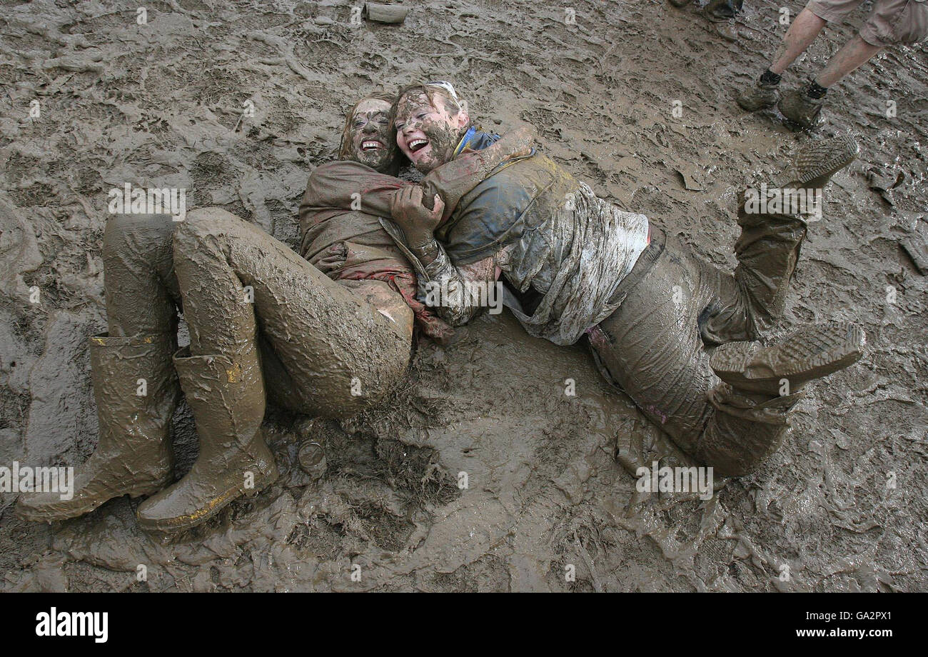 Muddy fans at the Oxegen Music festival at Punchestown racecourse Co ...