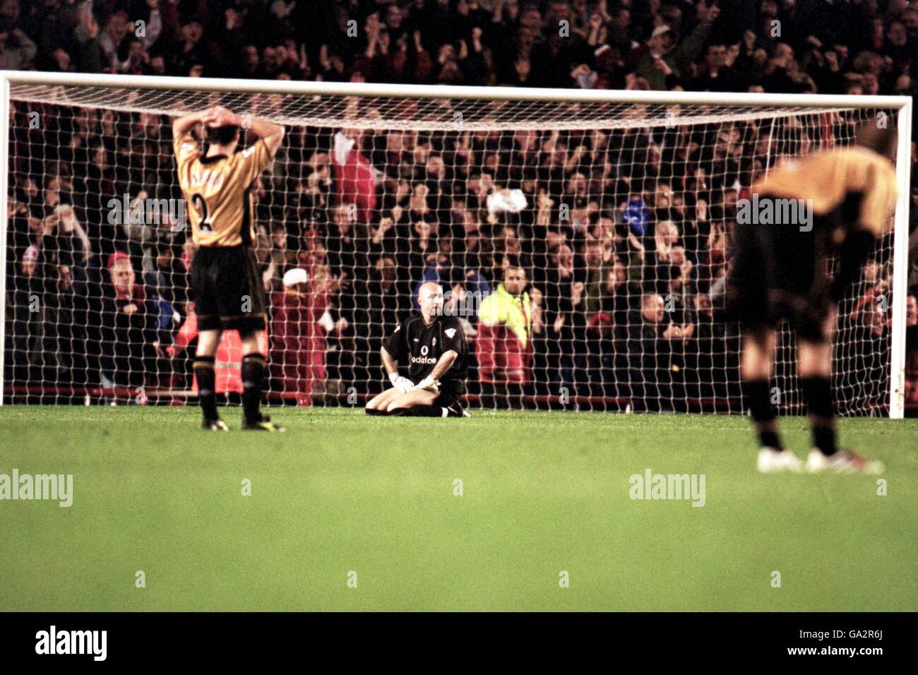 Manchester United S Fabien Barthez Sits Dejected After His First Blunder That Lead To Thierry Henry S 1st Goal Stock Photo Alamy