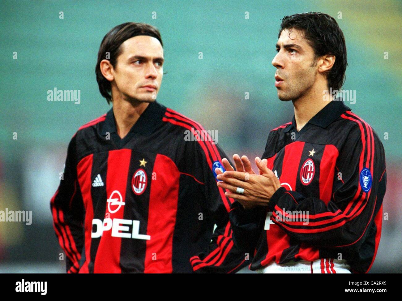 Soccer - UEFA Cup - Third Round - First Leg - AC Milan v Sporting Lisbon. AC Milan's Filippo Inzaghi (l) and Manuel Rui Costa (r) Stock Photo
