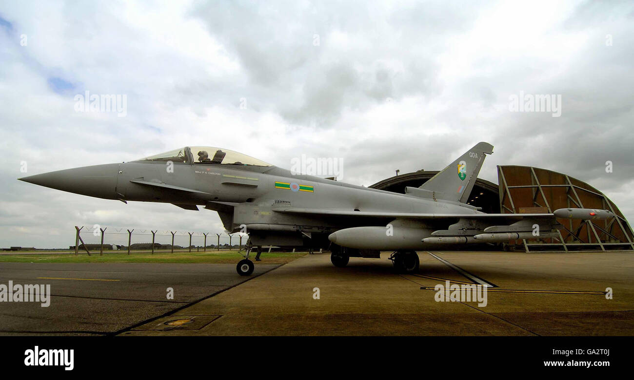 A Eurofighter Typhoon aircraft leaves its hangar at RAF Coningsby, Lincolnshire today. Stock Photo