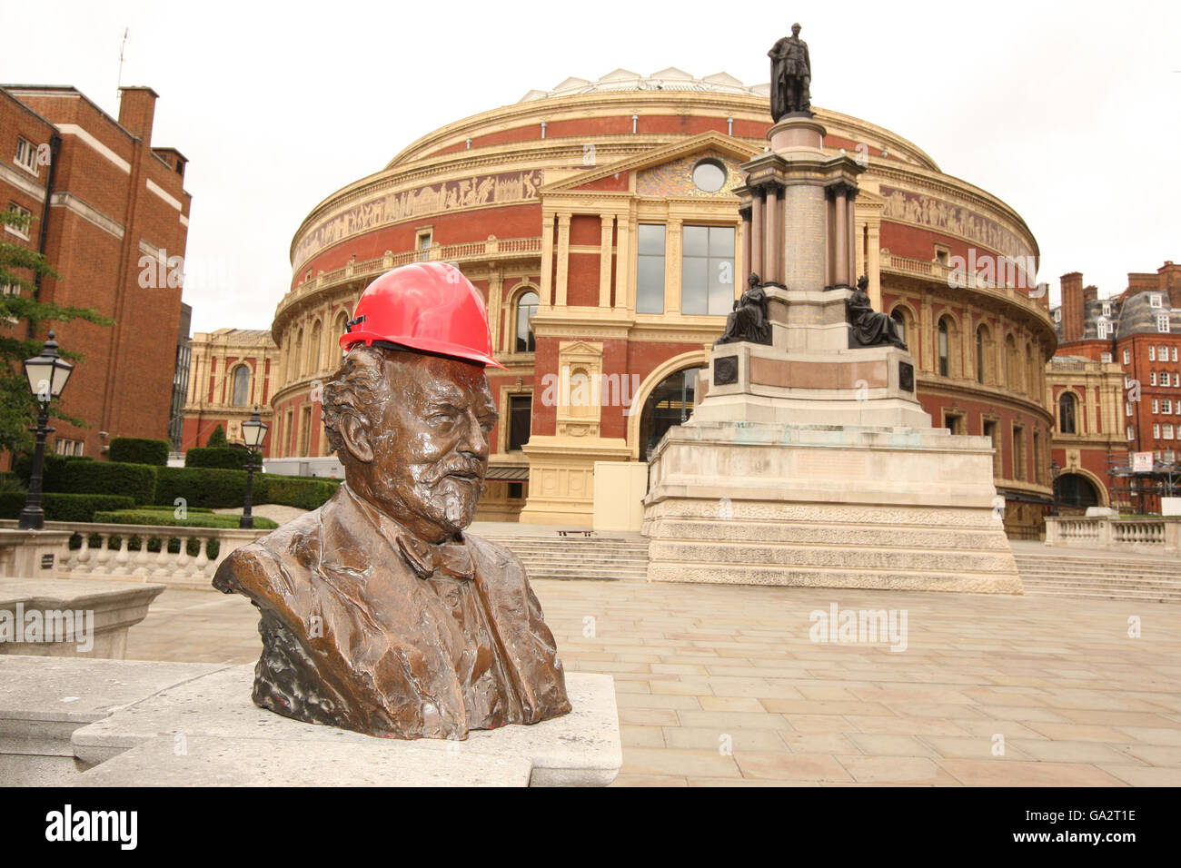 The bust of Proms originator Sir Henry Wood rests with hard had atop, whilst in transit to the Royal Albert Hall where it resides for the annual concert season, west London. Stock Photo
