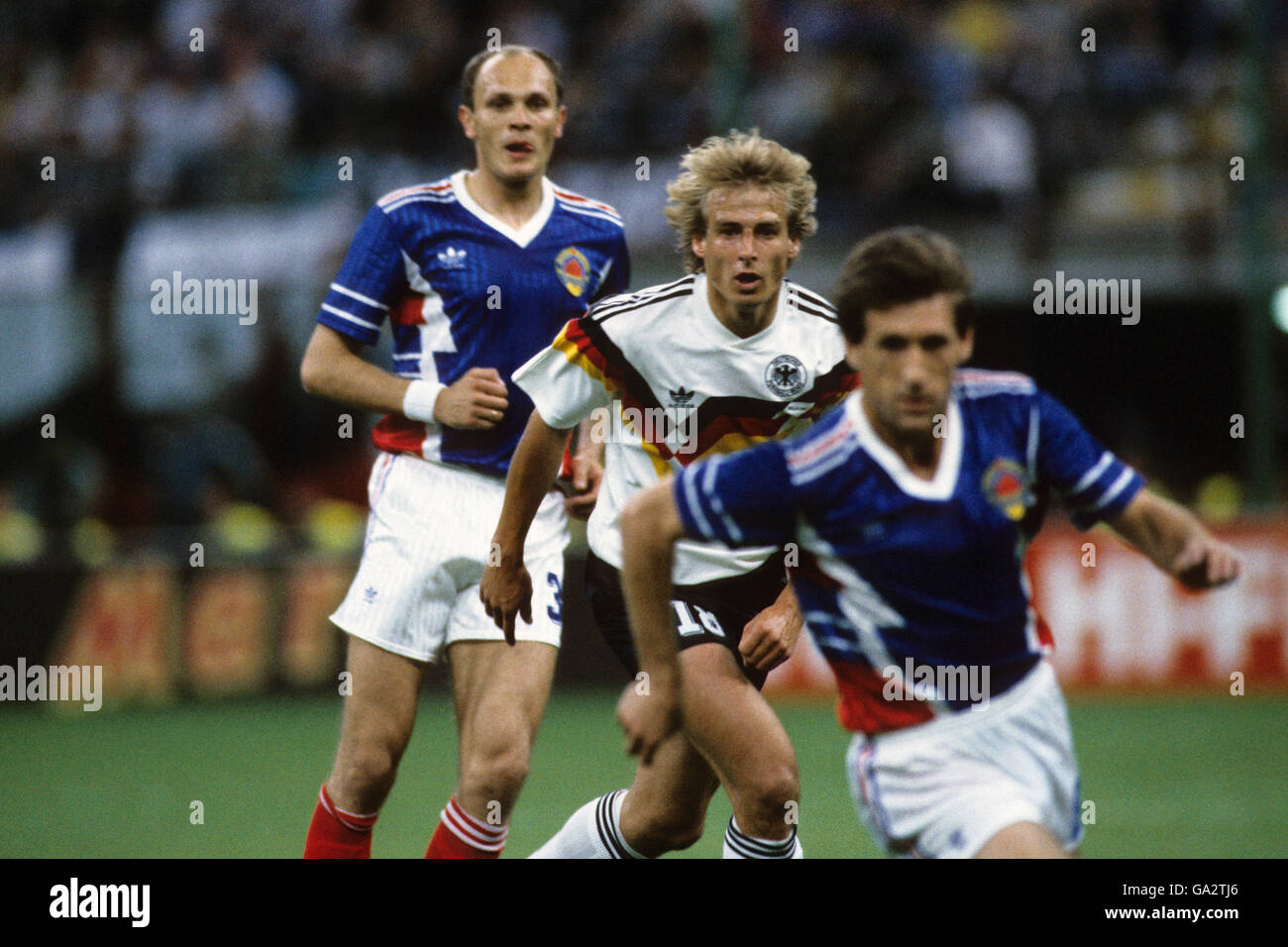 Soccer - World Cup Italia 90 - Group D - West Germany v Yugoslavia - Stadio Giuseppe Meazza, Milan. West Germany's Jurgan Klinsmann in action (c) Stock Photo
