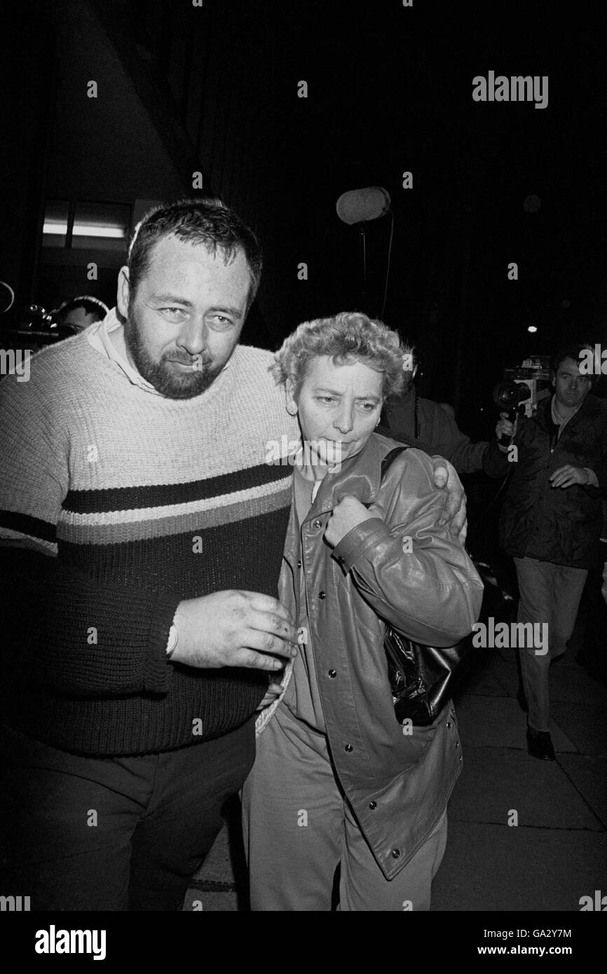 Pop singer Boy George's mother Mrs Dinah O'Dowd (r) is escorted from Albany Street police station after visiting her son who was arrested in connection with an alleged drugs offence. Stock Photo