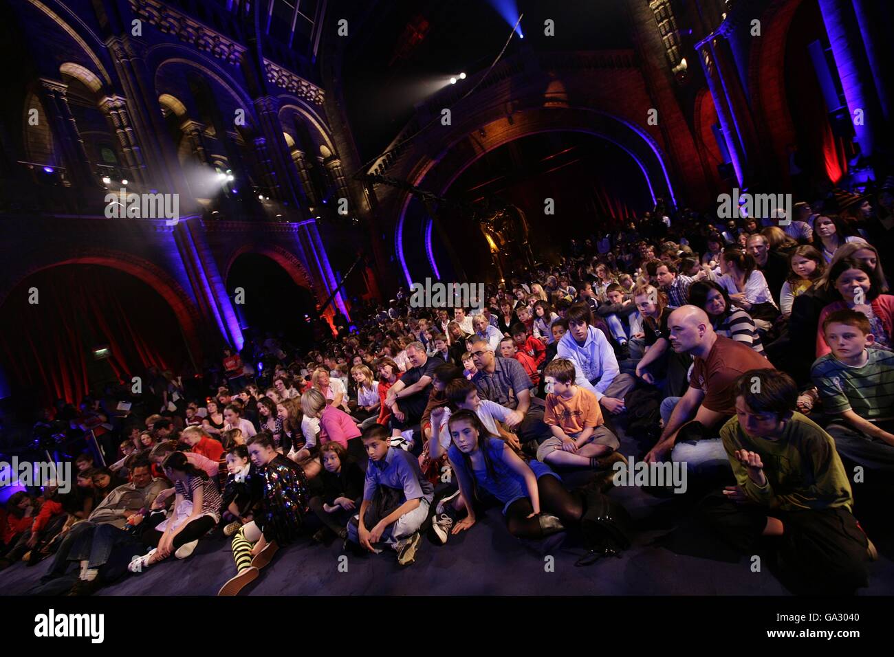 Fans await JK Rowling whi is reading extracts from her new book Harry ...