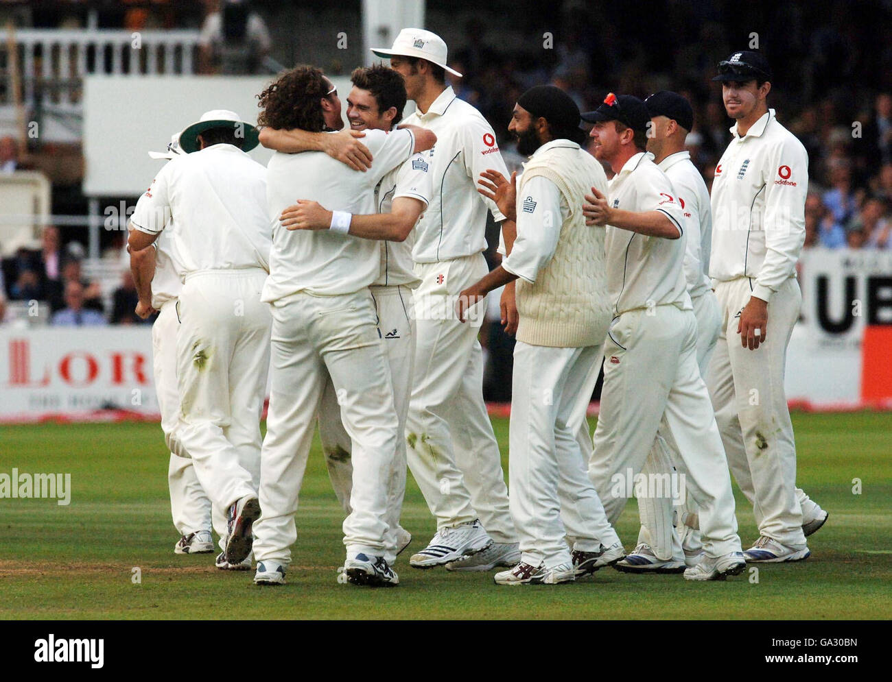England's James Anderson (third from left) celebrates with Ryan ...