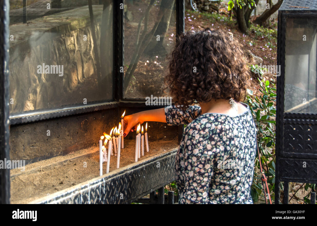 light candles and pray Stock Photo Alamy