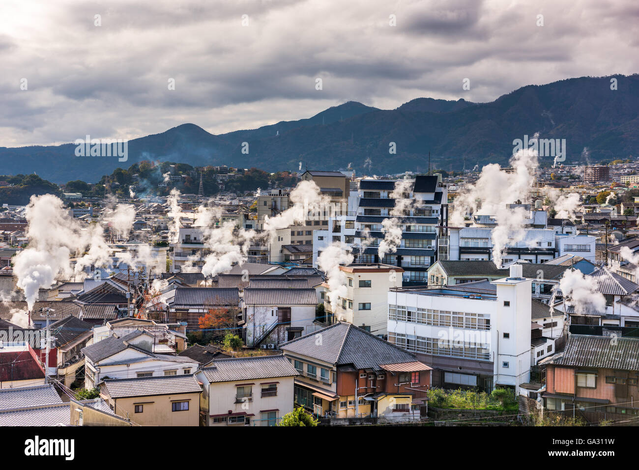 Beppu, Japan cityscape with hot spring bath houses. Stock Photo