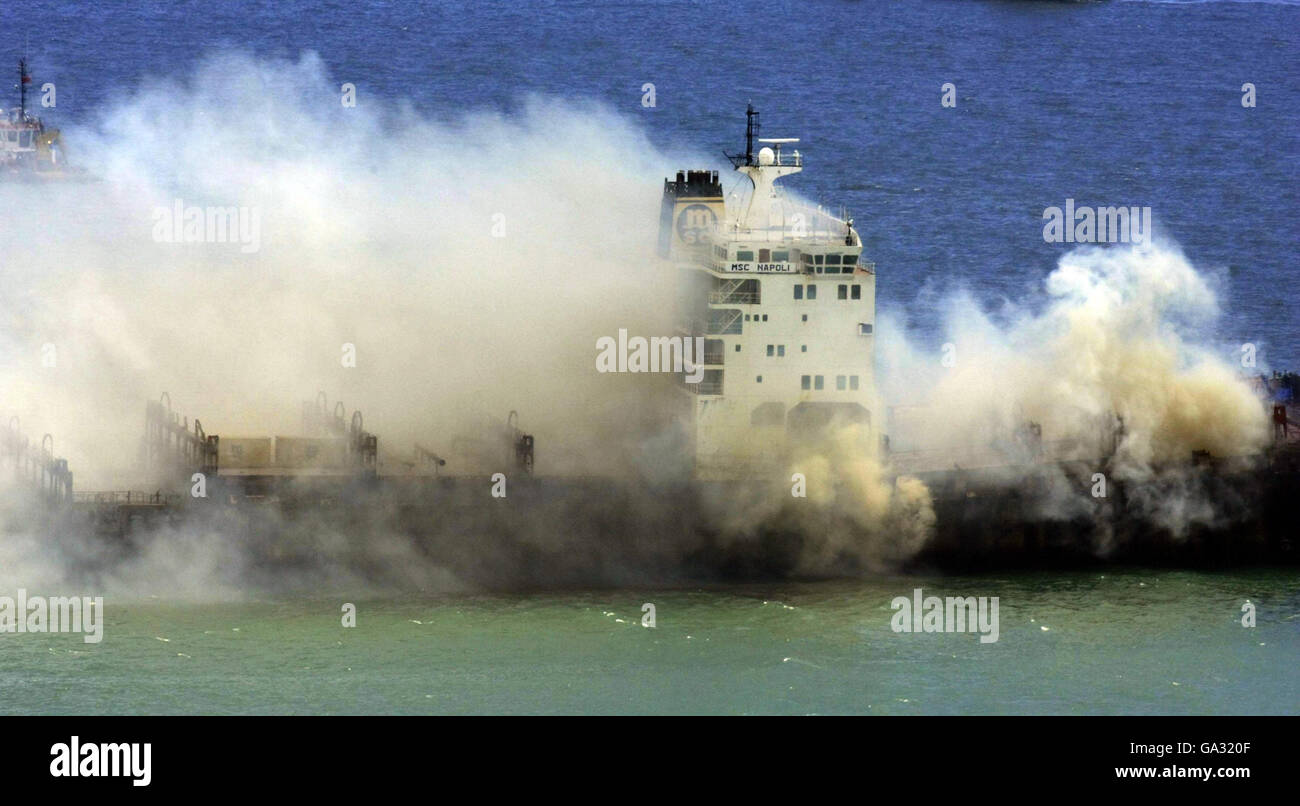 Salvage experts use explosives for a second time in their attempt to split the stricken container ship MSC Napoli so it can be removed in sections from the coastline off Branscombe in Devon. Stock Photo