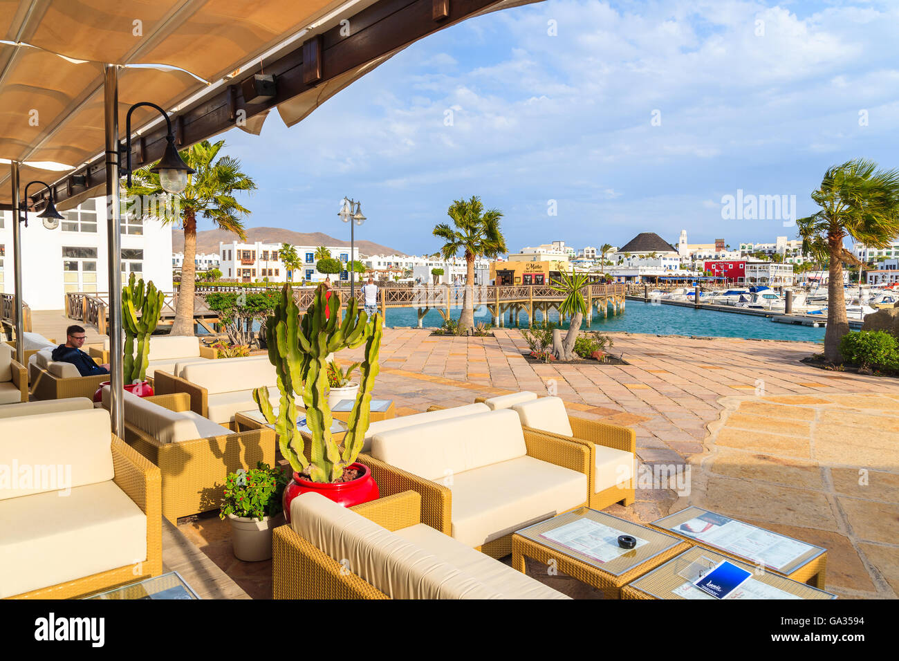 MARINA RUBICON, LANZAROTE ISLAND - JAN 11, 2015: restaurant in Rubicon yacht port. Lanzarote is most northern island in Canary Islands archipelago. Stock Photo