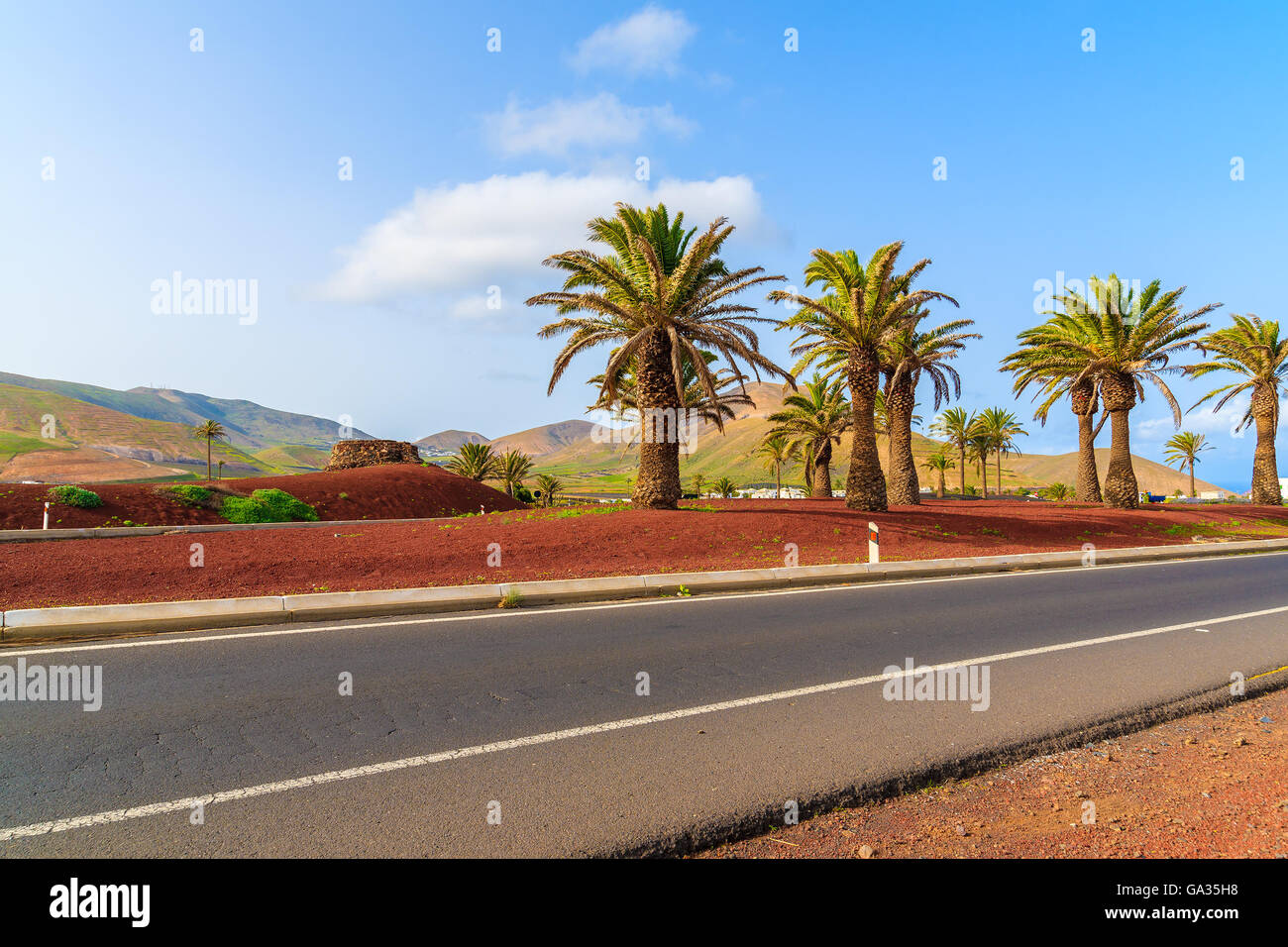 Scenic road in countryside landscape of Lanzarote island, Spain Stock Photo