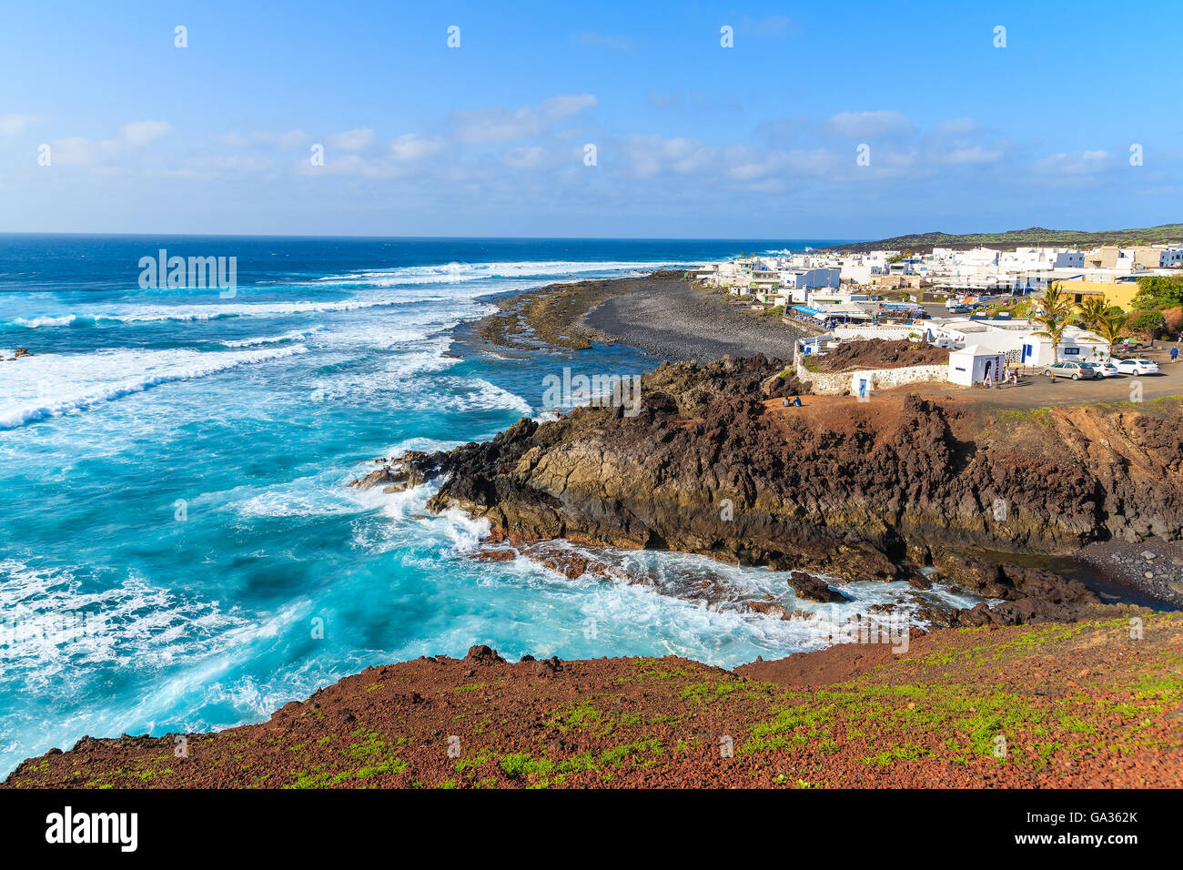 View of El Golfo village and blue ocean on coast of Lanzarote island, Spain Stock Photo