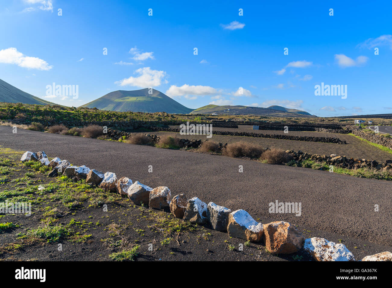 Rural road in La Geria vineyards, Lanzarote, Canary Islands, Spain Stock Photo