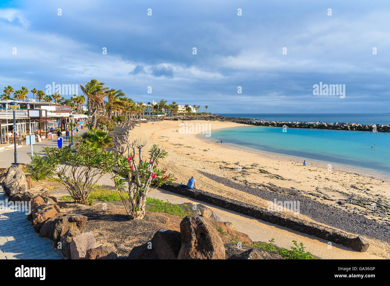 Flamingo beach in Playa Blanca holiday village on coast of Lanzarote island, Spain Stock Photo