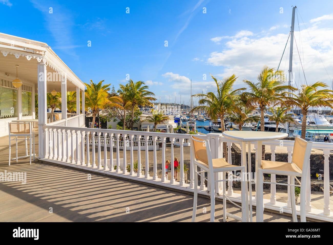 PUERTO CALERO MARINA, LANZAROTE ISLAND - JAN 17, 2015: traditional Caribbean style architecture of Puerto Calero marina. Yachting is a popular activity on Canary Islands. Stock Photo