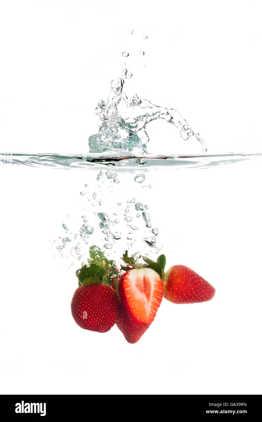 Strawberry Splash in Water Isolated on White Background