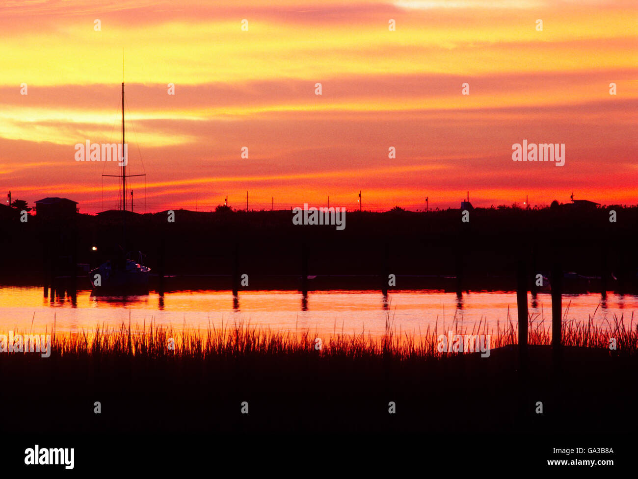 Sunset sky reflected in bay waters; coastal New Jersey; USA Stock Photo