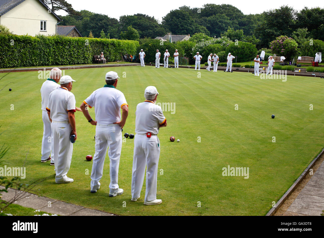 Players enjoying a match at Stoke Fleming Bowls Club in Devon, UK. Stock Photo