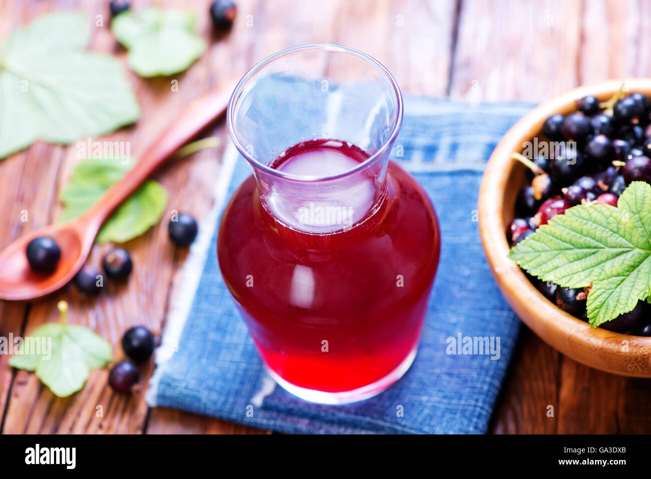 compot from berries in jug and on a table Stock Photo - Alamy