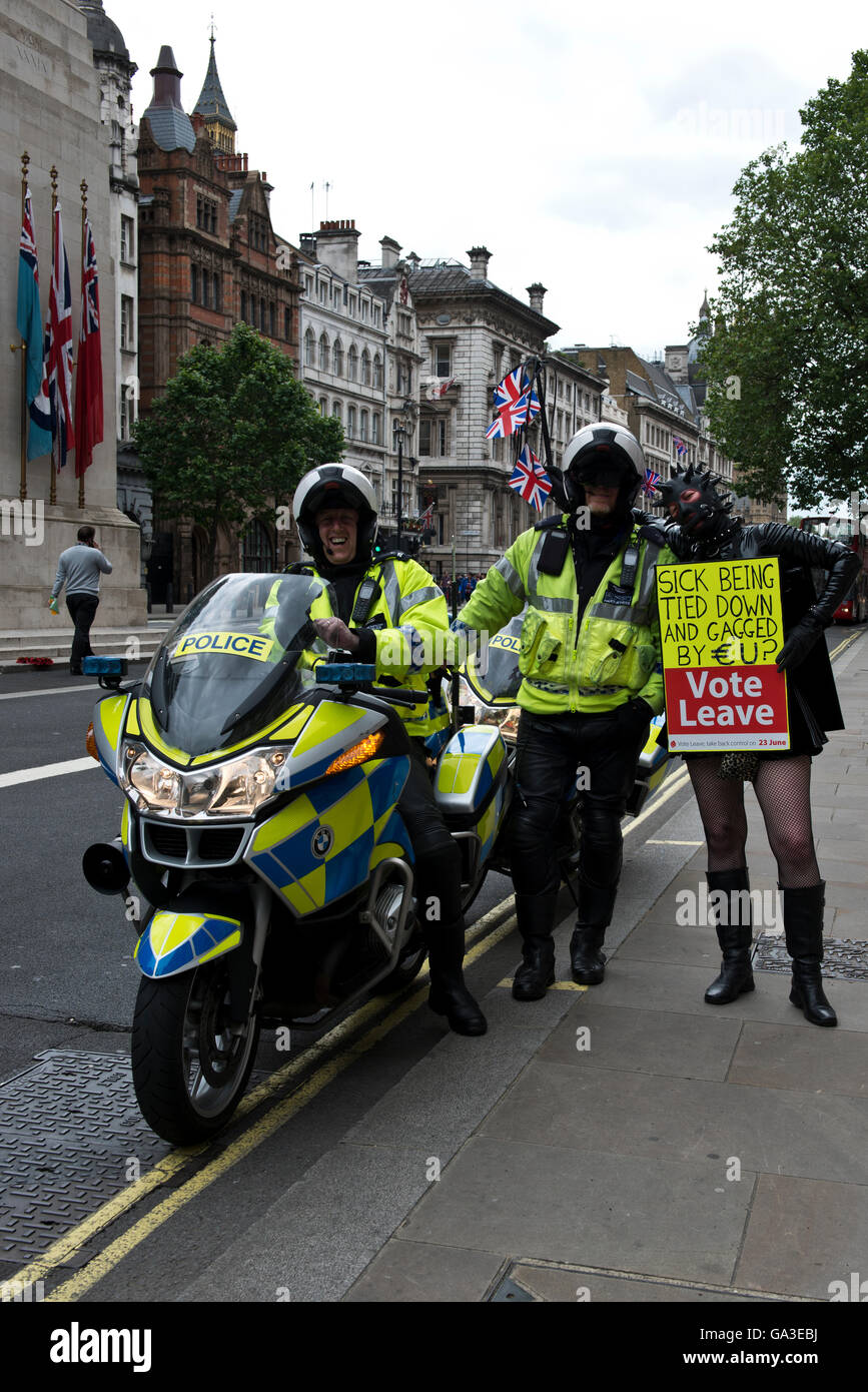 Two police officers stop and have a light-hearted chat with Madam ...