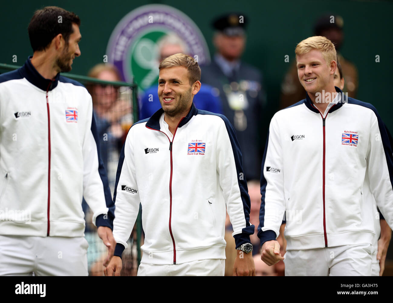 Great Britain's Davis Cup winners Dan Evans and Kyle Edmund (right) parade the trophy on centre court on day Six of the Wimbledon Championships at the All England Lawn Tennis and Croquet Club, Wimbledon. Stock Photo