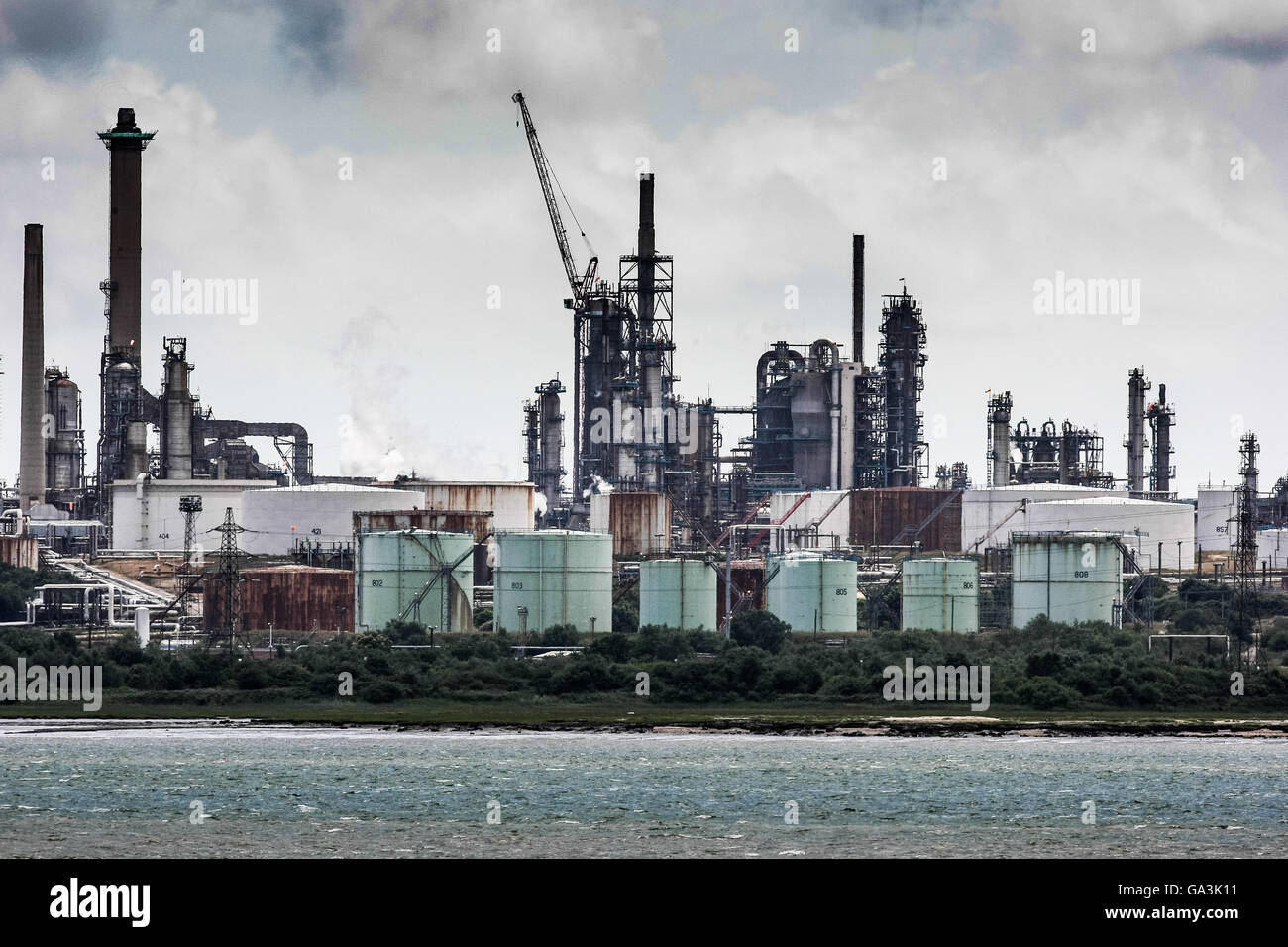Fawley Refinery is an oil refinery located at Fawley, Hampshire, England. The refinery is owned by Esso, Stock Photo