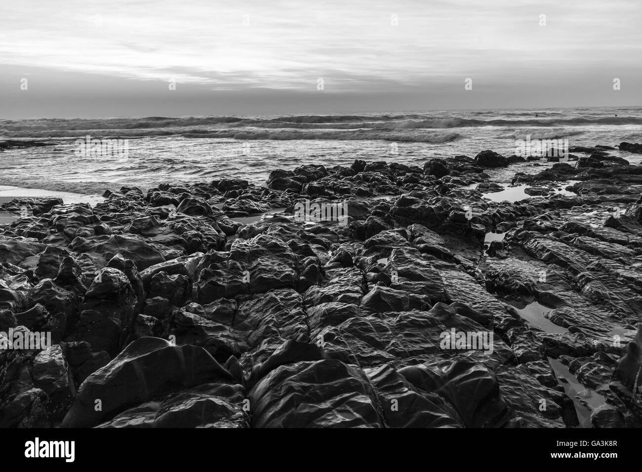 Rocky beach ocean waves shoreline at dawn morning landscape Stock Photo Alamy