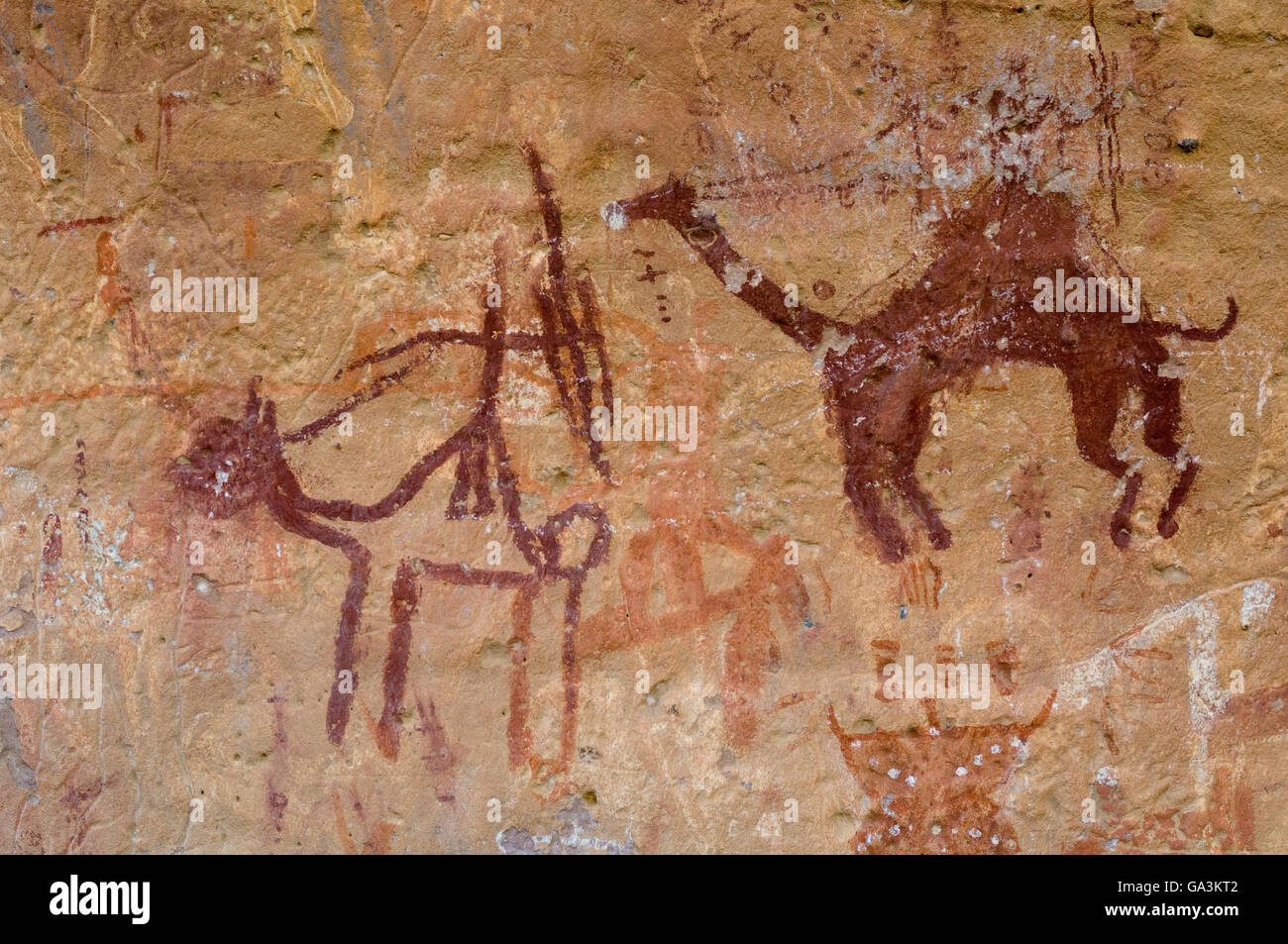 Prehistoric rock paintings, Akakus, Acacus Mountains or Tadrart Acacus, Sahara desert, Fezzan, Libya, North Africa Stock Photo