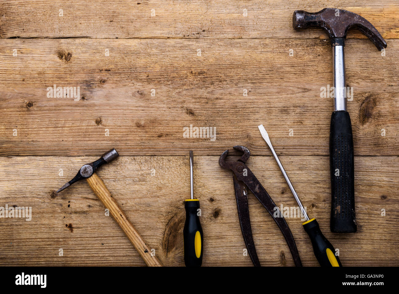 Selection of carpentry tools from above. on a  wooden worktop bench. Stock Photo