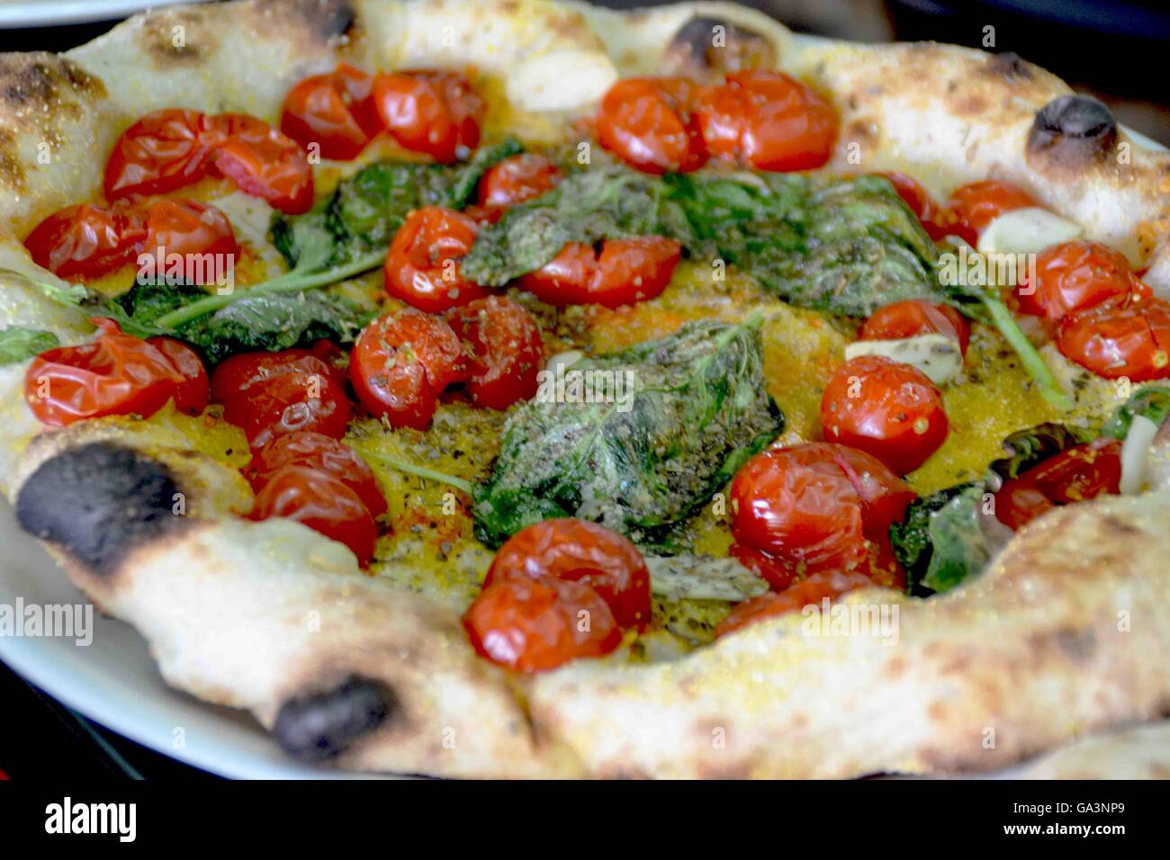 Torre Del Greco, Italy. 02nd July, 2016. Pizza produced by 'Officina della Pizza' located in Torre del Greco (Naples). Pizza is one of the most famous Italian dishes. It finds its best expression in Naples. © Maria Consiglia Izzo/Pacific Press/Alamy Live News Stock Photo