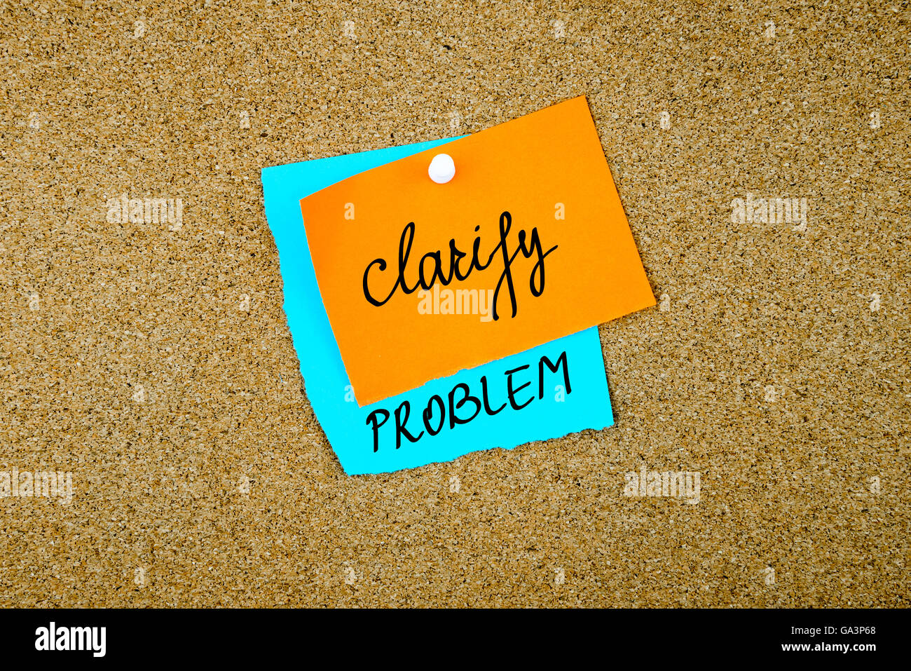 Clarify Problem written on paper notes pinned on cork board with white thumb tack, copy space available Stock Photo