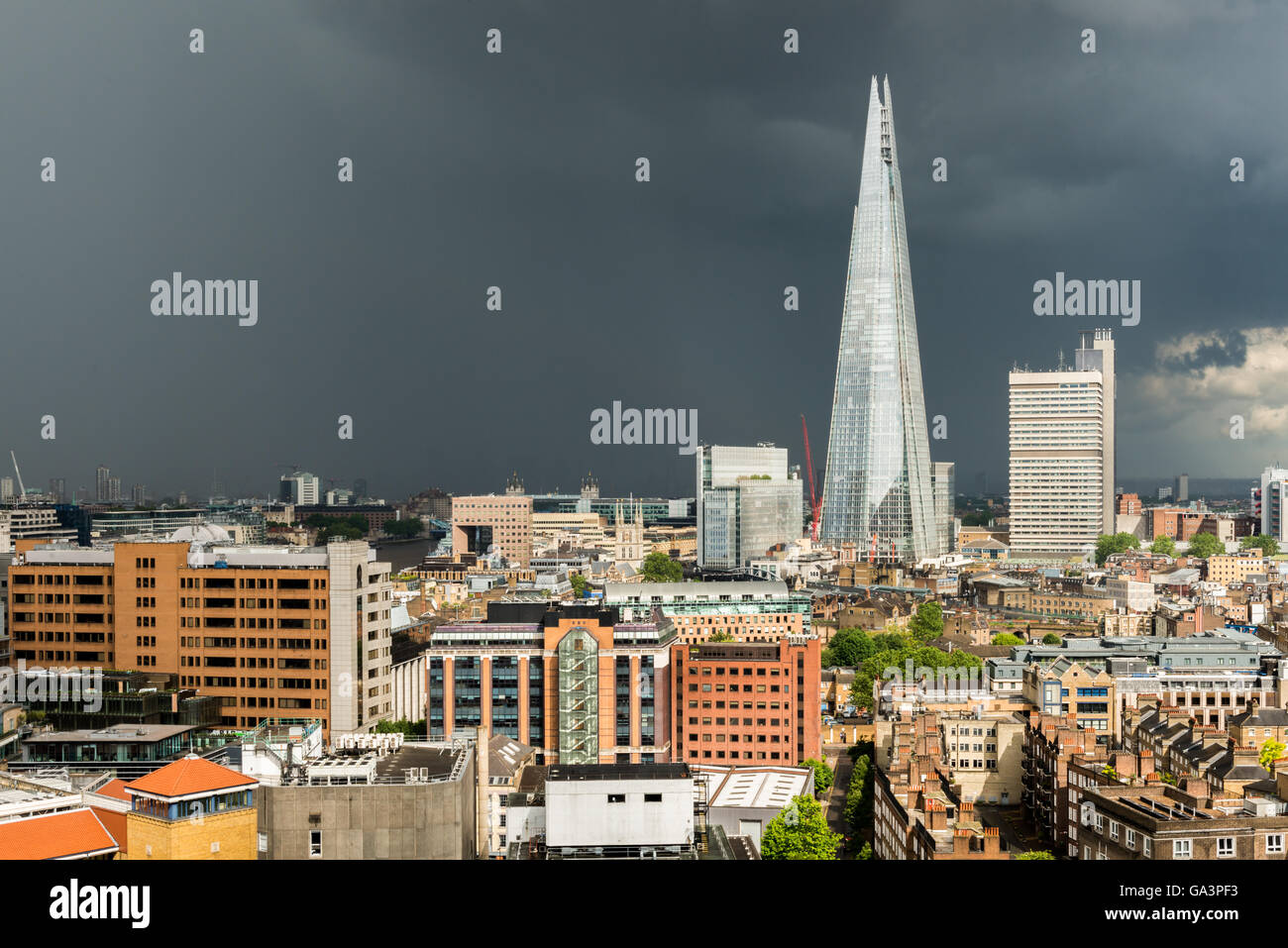 London, United Kingdom - June 25, 2016: London Skyline with moody sky seconds before a storm, with Shard in front Stock Photo
