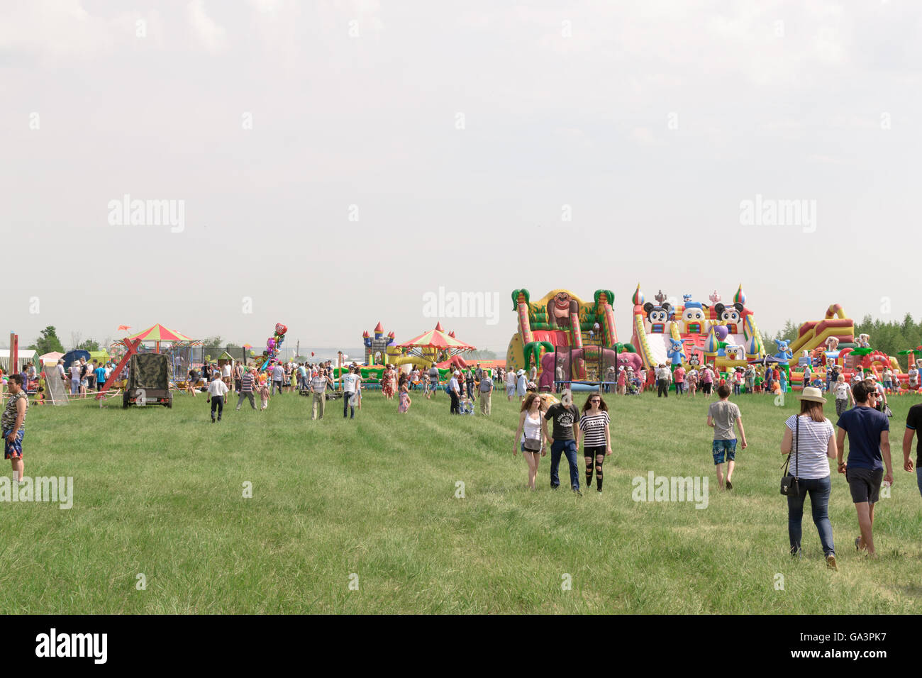 Crowd of people at an outdoor fun park in Russia Stock Photo