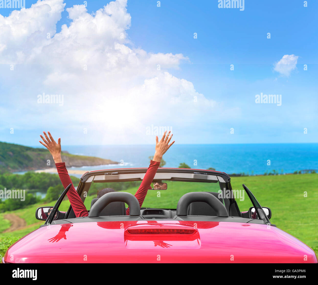 Girl in a red convertible car on a background seascape Stock Photo - Alamy