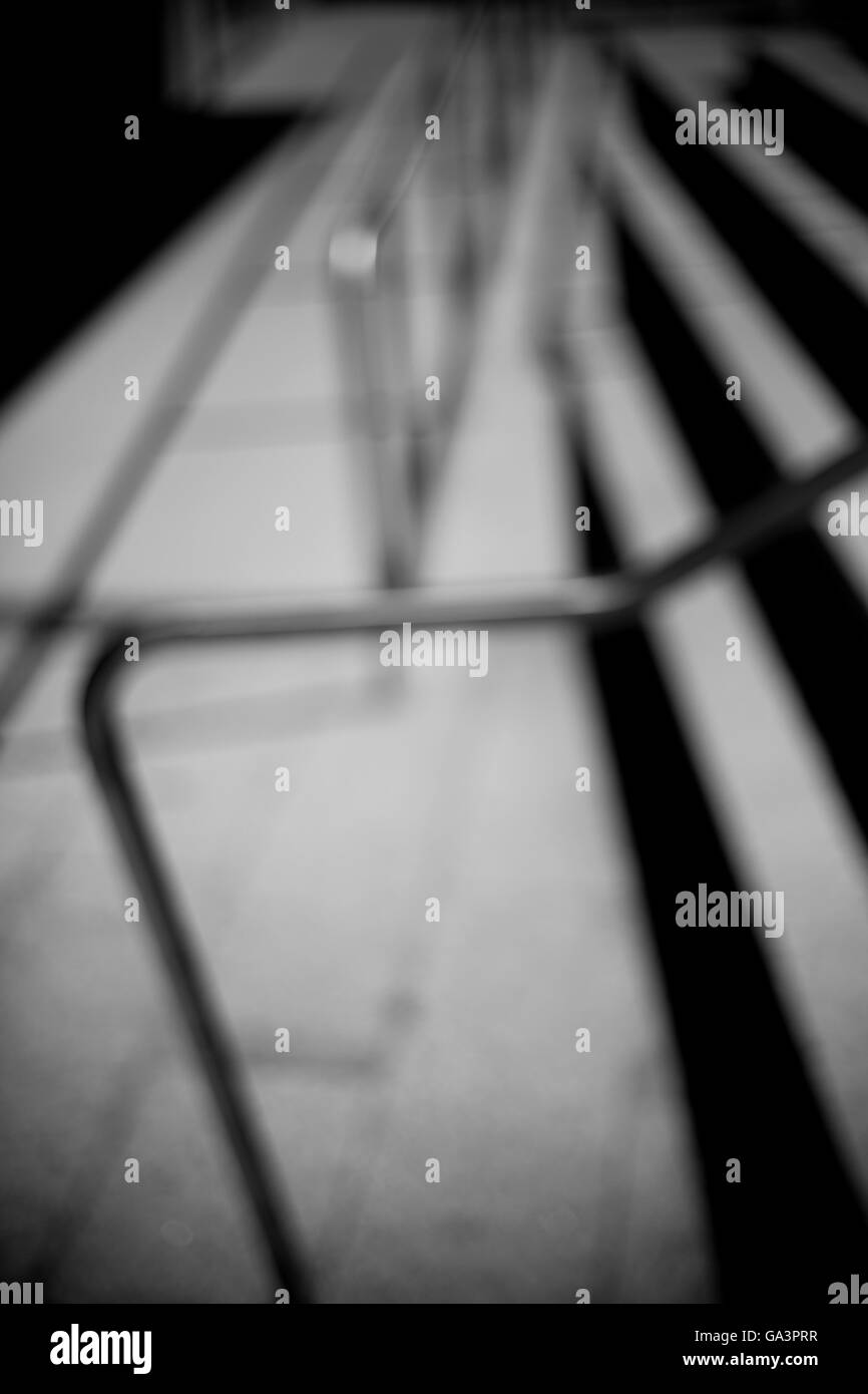 Soft focus view of stairs and railing creating abstract image Stock Photo