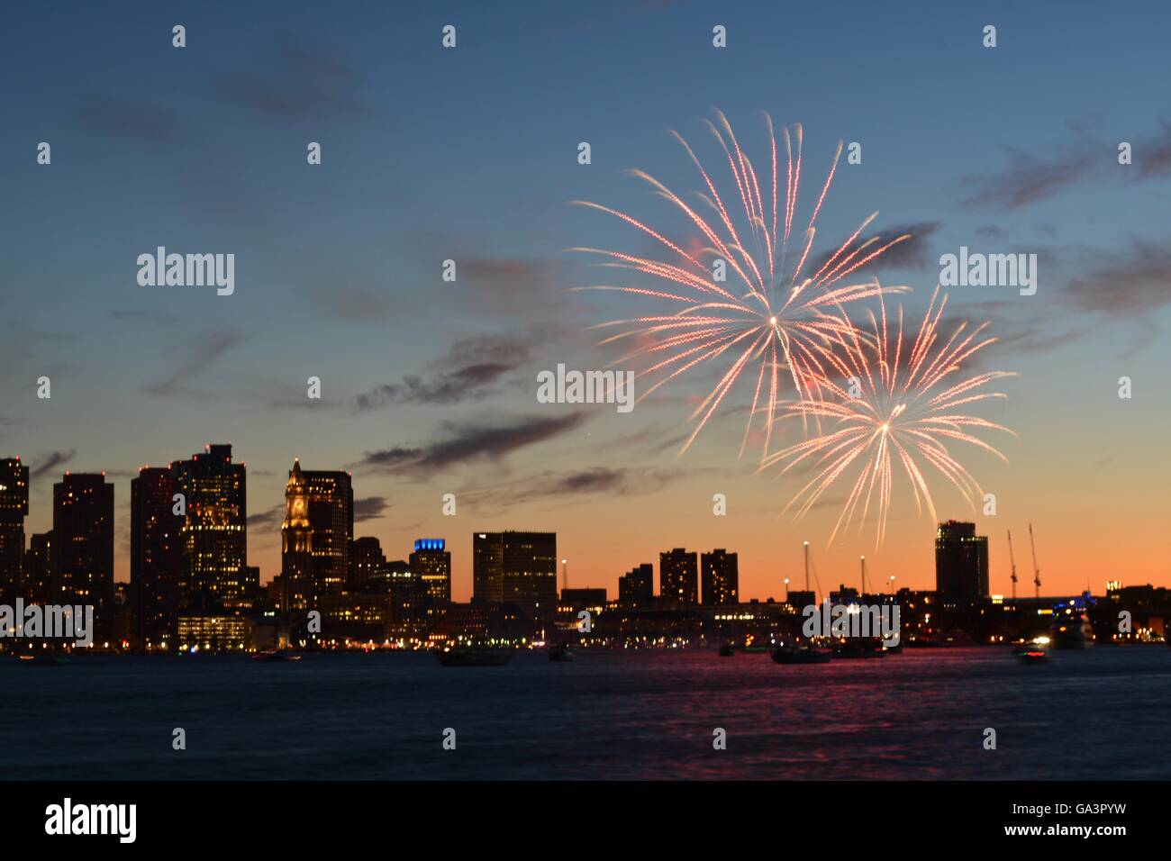 Boston Harborfest Independence Day celebration sunset fireworks show in