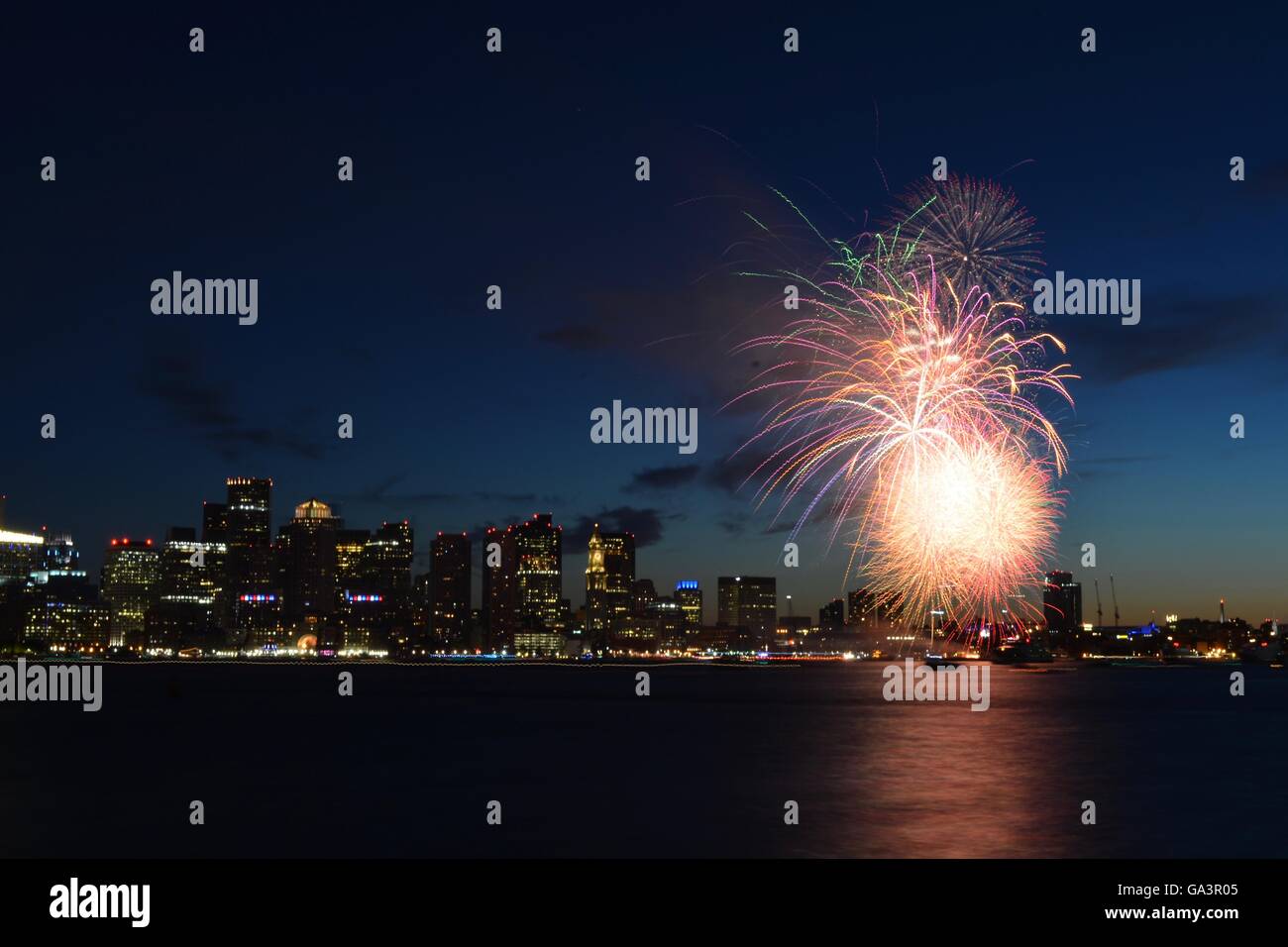 Boston Harborfest Independence Day celebration sunset fireworks show in
