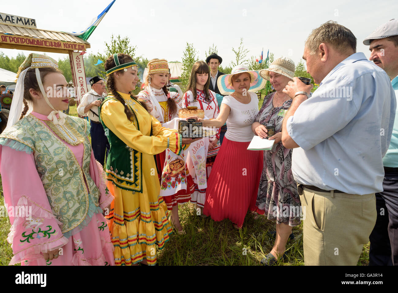 Man Greeted by Russian Women in national traditional dress Stock Photo