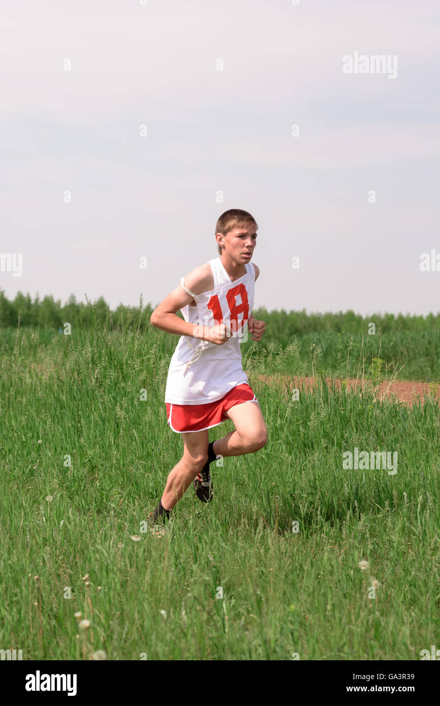 Young Runners in a Competition Outside Stock Photo Alamy