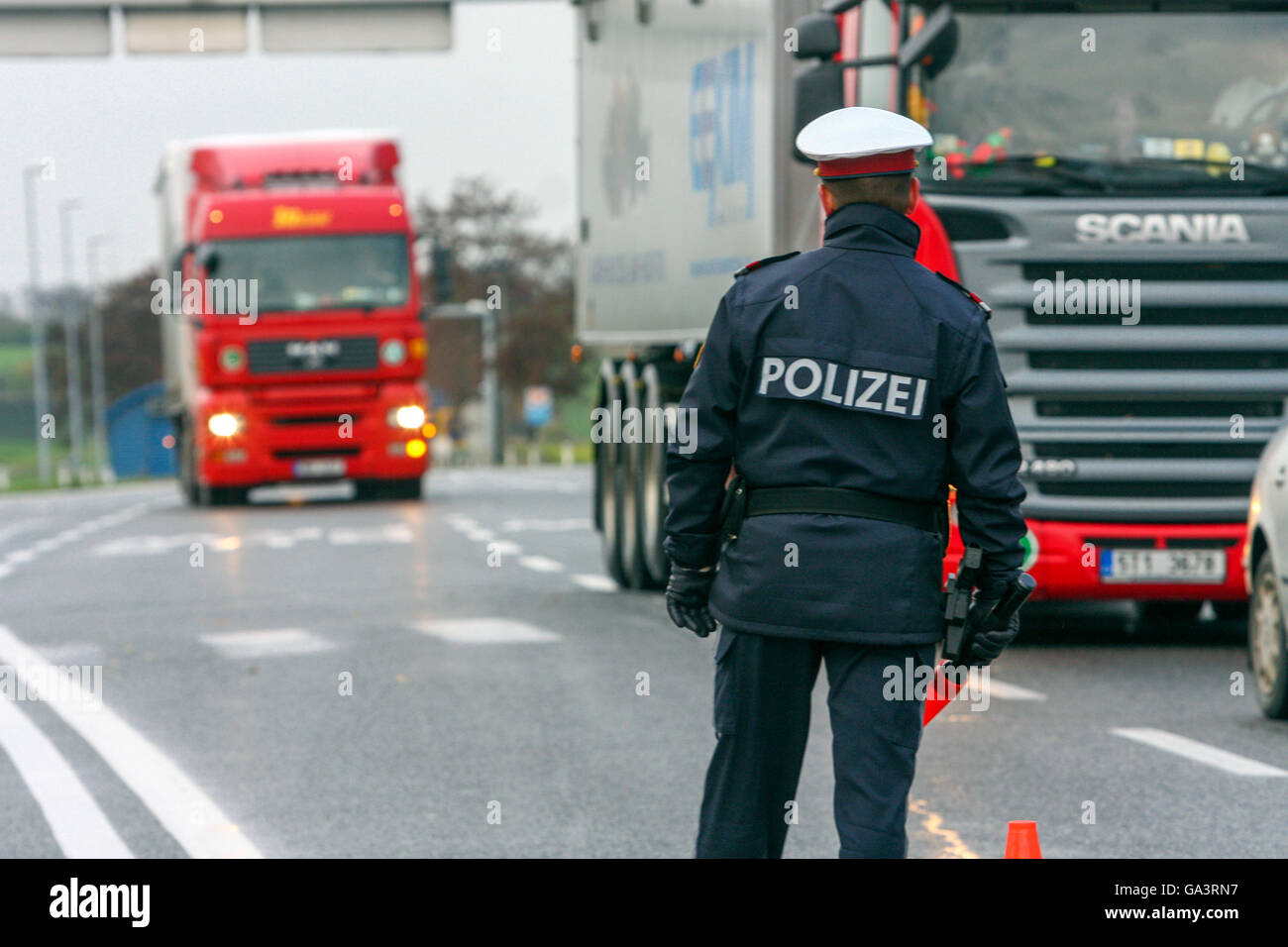 Austrian police, a traffic policeman checks trucks, Austria, Europe Stock Photo