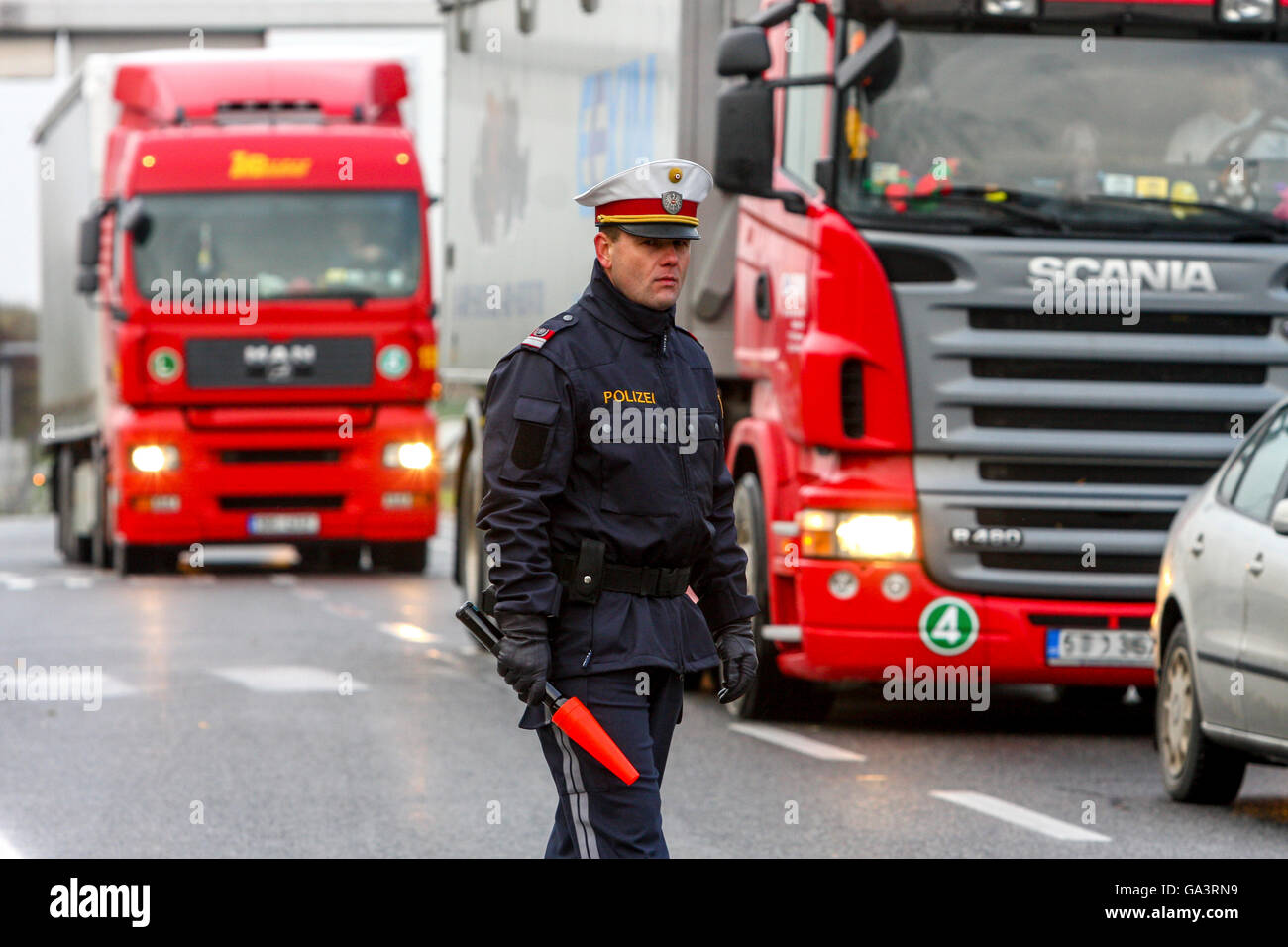 Austrian police, traffic policeman checks trucks, Austria, Europe Stock Photo