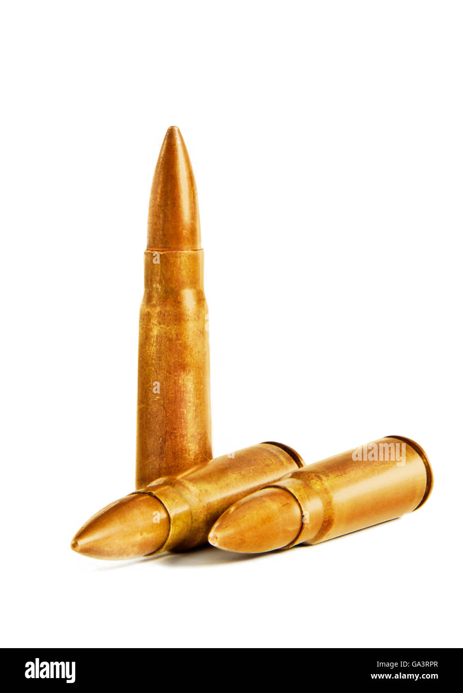 Three 7.62x39mm Old Assault Rifle Bullets Isolated on White Background Stock Photo