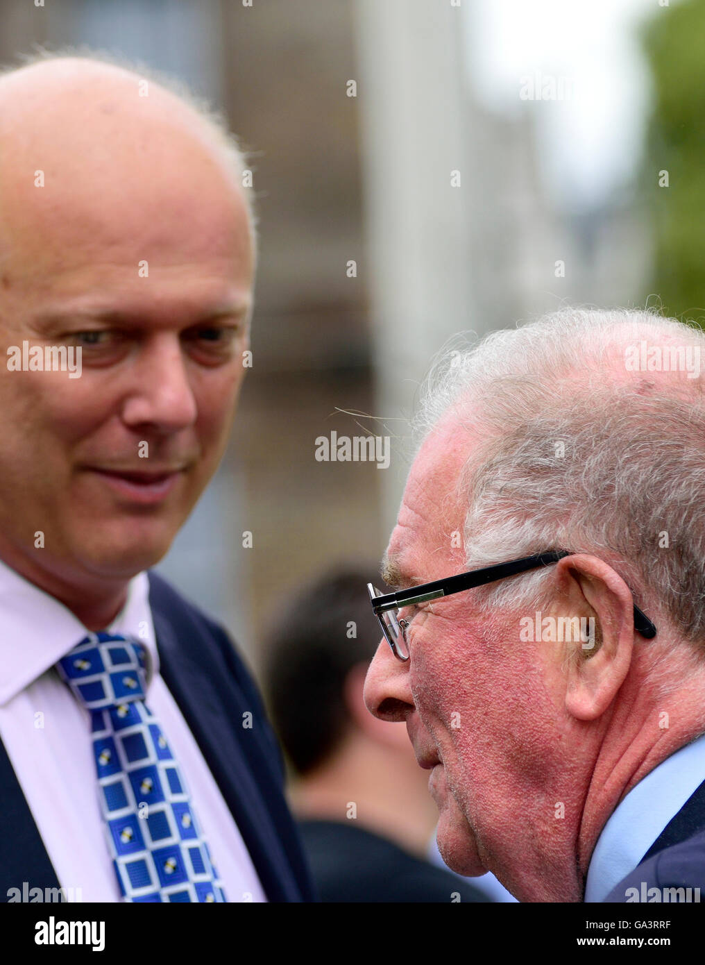 Sir Roger Gale MP (Con: North Thanet) talking to Chris Grayling MP (Con: Epsom and Ewell), College Green, Westminster, June 2016 Stock Photo