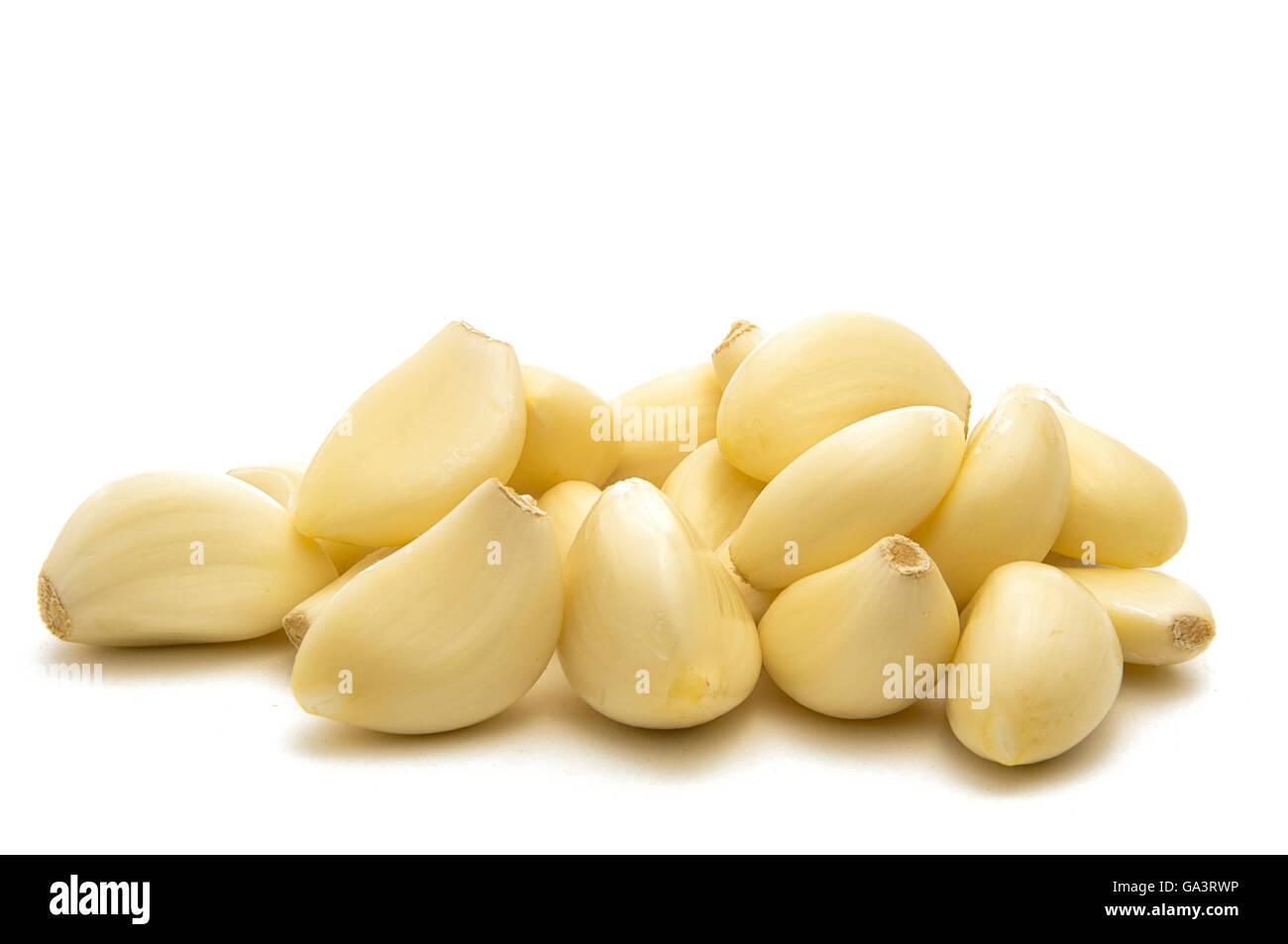 Peeled Garlic Cloves Isolated on White Background Stock Photo - Alamy
